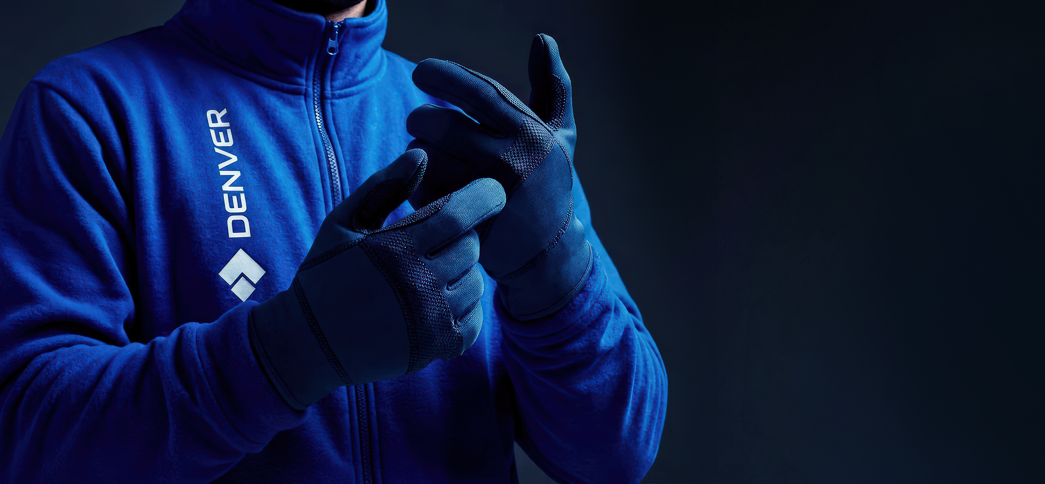 Denver operator wearing blue gloves